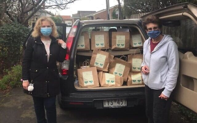 Ellen Frajman (right) with Mazon’s soup share bags. Ellen Frajman (right) with Mazon’s soup share bags.