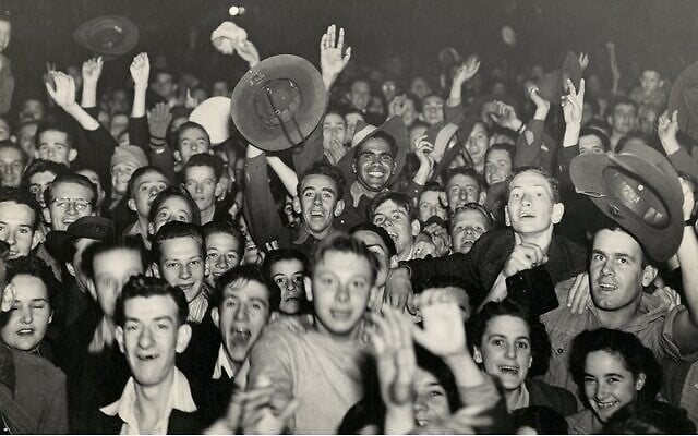 A crowd of civilians and servicemen celebrates Victory in the Pacific (VP) Day in a Brisbane street on August 15, 1945. Photo: Australian War Memorial A crowd of civilians and servicemen celebrates Victory in the Pacific (VP) Day in a Brisbane street on August 15, 1945. Photo: Australian War Memorial