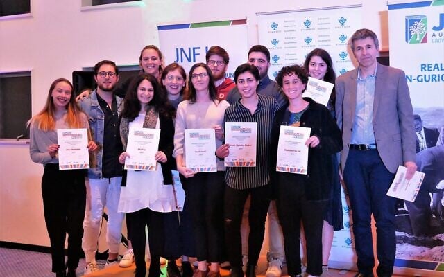 Changemakers at a previous awards ceremony with JNF's Dan Springer (right). Changemakers at a previous awards ceremony with JNF's Dan Springer (right).