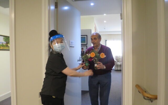 Arcare Caulfield resident Leo Bloumis receives his flowers as a result of the
Sponsor a Floral Posy Jar initiative. Arcare Caulfield resident Leo Bloumis receives his flowers as a result of the
Sponsor a Floral Posy Jar initiative.