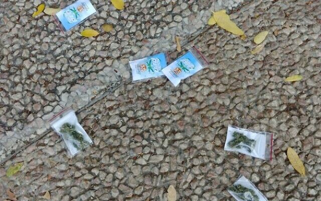 Bags of marijuana litter the street in Tel Aviv. Photo: Israel Police Bags of marijuana litter the street in Tel Aviv. Photo: Israel Police