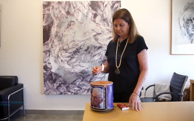 Dalia Rabin lighting a memorial candle for her father during the online
commemoration. Photo: Screenshot Dalia Rabin lighting a memorial candle for her father during the online
commemoration. Photo: Screenshot