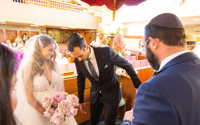 Carli Koonin and Justin Balbir with Rabbi Daniel Rabin. Carli Koonin and Justin Balbir with Rabbi Daniel Rabin.