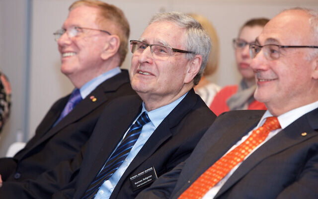 Norman Seligman (centre) will step down in the second half of this year. Norman Seligman (centre) will step down in the second half of this year.