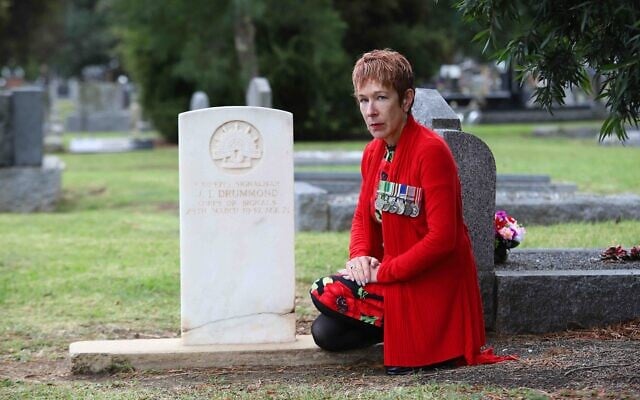 Sergeant Julie Leder, representative of VAJEX at the gravestone of James
Drummond, who was in fact Jacob Sorsky. Photo: Peter Haskin Sergeant Julie Leder, representative of VAJEX at the gravestone of James
Drummond, who was in fact Jacob Sorsky. Photo: Peter Haskin