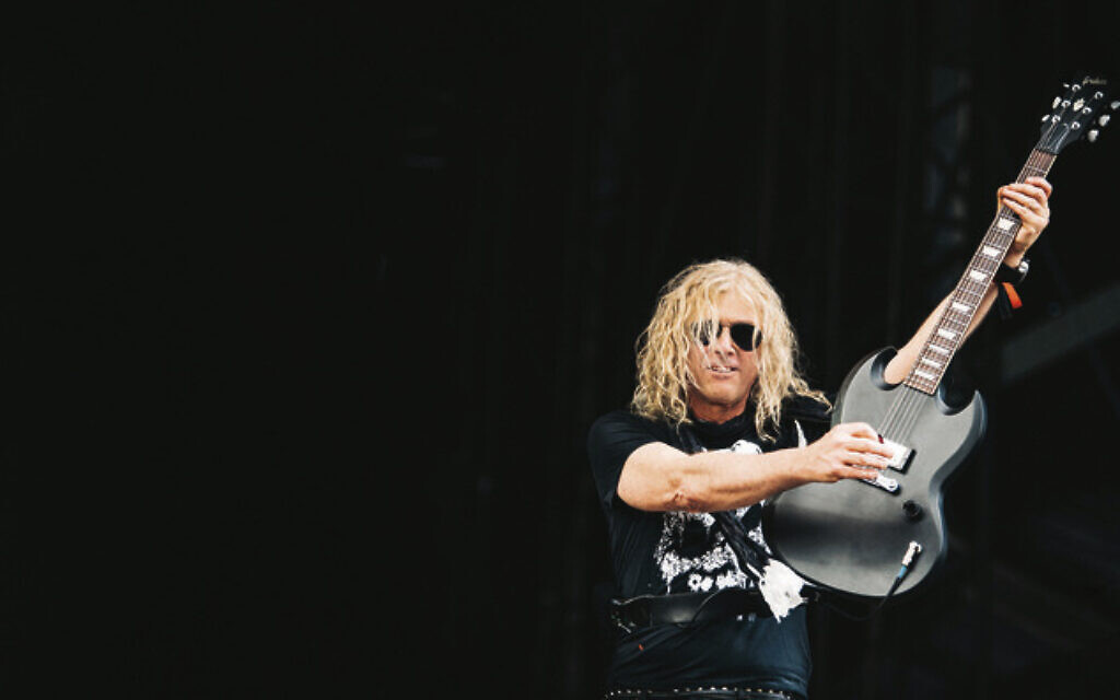 Guitarist David Lowy performing with his band, The Dead Daisies. Photo: Oliver Halfin Guitarist David Lowy performing with his band, The Dead Daisies. Photo: Oliver Halfin