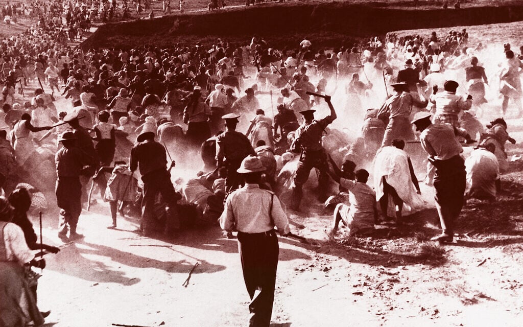 South African police beat African women with
clubs in Durban in 1959, after the women raided a
beer hall in protest against police cracking down
on their home-brewing activities. Photo: AP Photo South African police beat African women with
clubs in Durban in 1959, after the women raided a
beer hall in protest against police cracking down
on their home-brewing activities. Photo: AP Photo