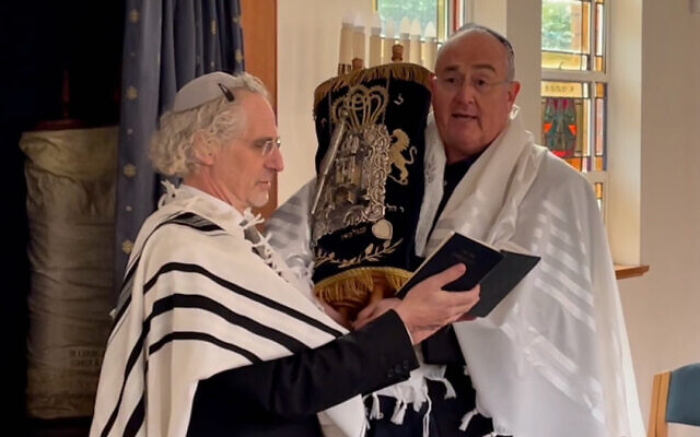 Walt Secord (right) with Rabbi Jeffrey Kamins at his naming ceremony. Walt Secord (right) with Rabbi Jeffrey Kamins at his naming ceremony.
