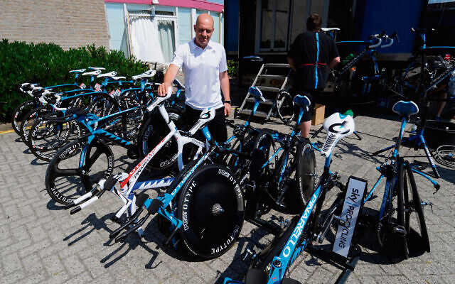 Sky Cycling Team Principal and Head of British Cycling Dave Brailsford checks the Sky Teams bikes in Rotterdam during the Tour de France preview day in Rotterdam ahead of the race. Photo: John Giles/PA Wire. Sky Cycling Team Principal and Head of British Cycling Dave Brailsford checks the Sky Teams bikes in Rotterdam during the Tour de France preview day in Rotterdam ahead of the race. Photo: John Giles/PA Wire.