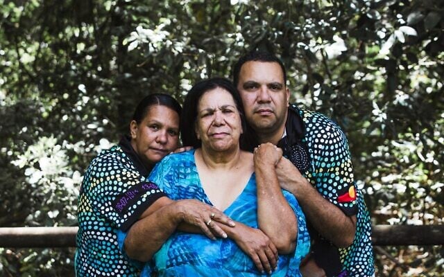 Muriel Craig, the mother of Colleen Walker-Craig (centre), with her daughter Paula Craig (left) and son Lucas Craig (right). Photo: Kate Holmes.