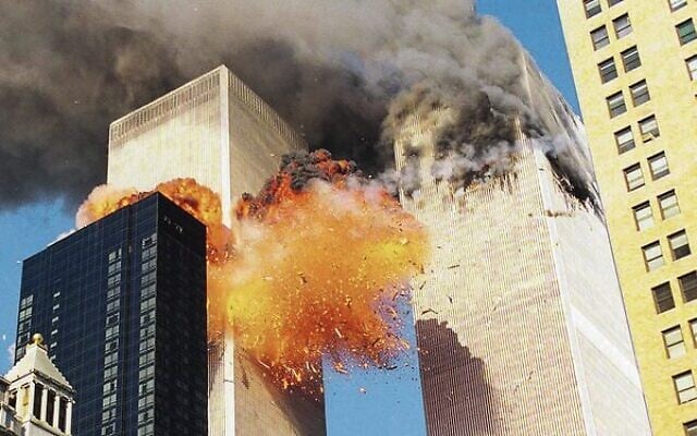 Smoke billows from the Twin Towers following the attack of September 11, 2001. Photo: AP Photo Smoke billows from the Twin Towers following the attack of September 11, 2001. Photo: AP Photo