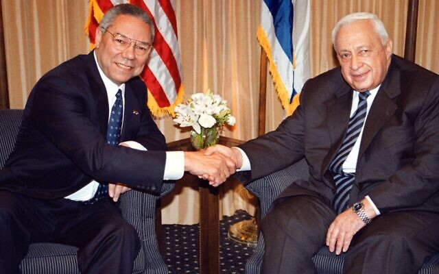 US Secretary of State Colin Powell, left, shakes hands with Israeli Prime Minister-elect Ariel Sharon in Jerusalem on February 25, 2001. Photo: Getty Images US Secretary of State Colin Powell, left, shakes hands with Israeli Prime Minister-elect Ariel Sharon in Jerusalem on February 25, 2001. Photo: Getty Images