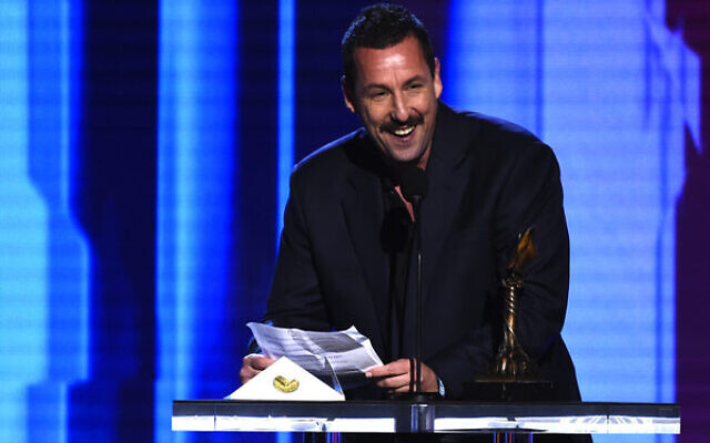 Adam Sandler accepts the award for best male lead for Uncut Gems at the 35th Film Independent Spirit Awards in 2020. Photo: AP Photo/Chris Pizzello Adam Sandler accepts the award for best male lead for Uncut Gems at the 35th Film Independent Spirit Awards in 2020. Photo: AP Photo/Chris Pizzello