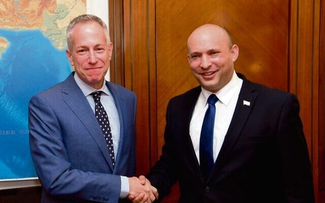Michael Ratney (left) with Naftali Bennett in June.Photo: Amos Ben-Gershom/GPO Michael Ratney (left) with Naftali Bennett in June.Photo: Amos Ben-Gershom/GPO