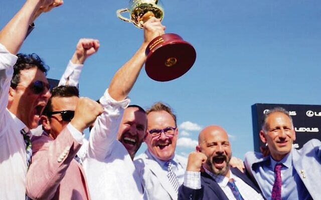 Brae Sokolski holding the 2021 Lexus Melbourne Cup trophy.
Photo: Victoria Racing Club Brae Sokolski holding the 2021 Lexus Melbourne Cup trophy.
Photo: Victoria Racing Club