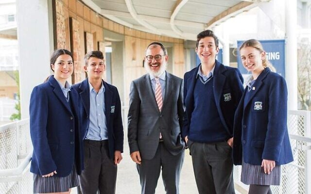 Rabbi Yehoshua Smukler with students. Photo: Nadine Saacks Rabbi Yehoshua Smukler with students. Photo: Nadine Saacks