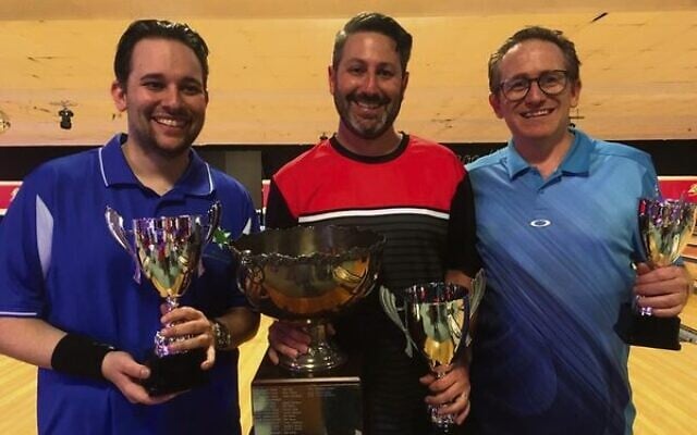 From left: Scratch runner-up Justin Kennedy, winner Adam Goldberg, and tournament director Ronnie Lang. From left: Scratch runner-up Justin Kennedy, winner Adam Goldberg, and tournament director Ronnie Lang.