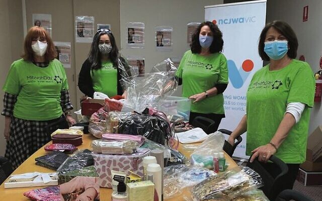NCJWA Vic's Mitzvah Day team preparing hampers for women and children in a domestic violence shelter last year. NCJWA Vic's Mitzvah Day team preparing hampers for women and children in a domestic violence shelter last year.