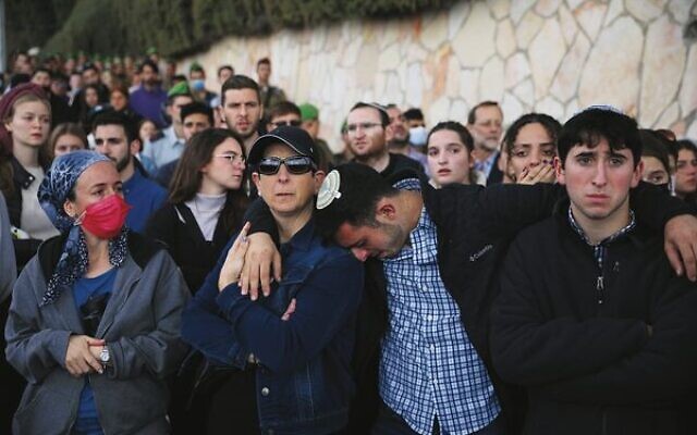Mourners grieve at Eli Kay's funeral in Jerusalem.Photo: AP Photo/Oded Balilty Mourners grieve at Eli Kay's funeral in Jerusalem.Photo: AP Photo/Oded Balilty