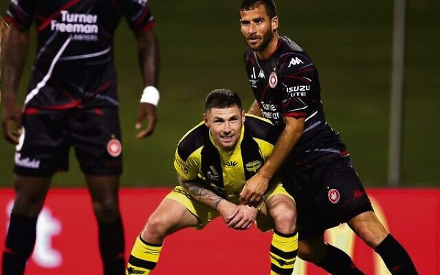 Tomer Hemed (on right) in action for the Wanderers against his old team, Wellington Phoenix. Photo: Mark Kolbe/Getty Images Tomer Hemed (on right) in action for the Wanderers against his old team, Wellington Phoenix. Photo: Mark Kolbe/Getty Images