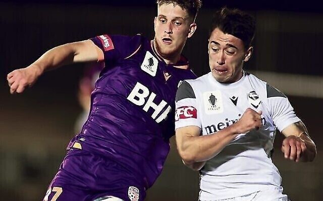 Jacob Muir (left) competes for the ball with Luis Lawrie-Lattanzio in an FFA Cup match in Adelaide on November 24. Photo: Kelly Barnes/Getty Images Jacob Muir (left) competes for the ball with Luis Lawrie-Lattanzio in an FFA Cup match in Adelaide on November 24. Photo: Kelly Barnes/Getty Images
