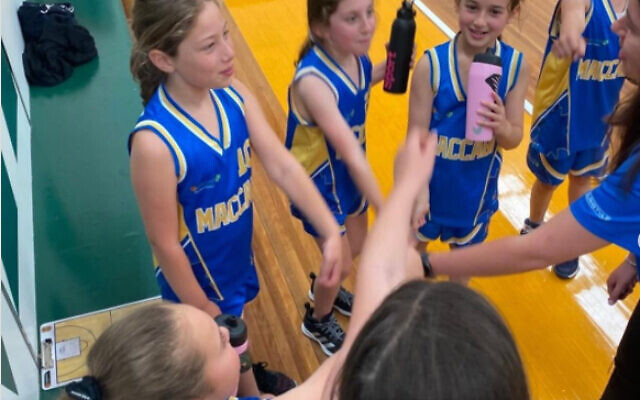The U10 Maccabi girls' Dream Team side celebrate a win in their last game of the year. The U10 Maccabi girls' Dream Team side celebrate a win in their last game of the year.