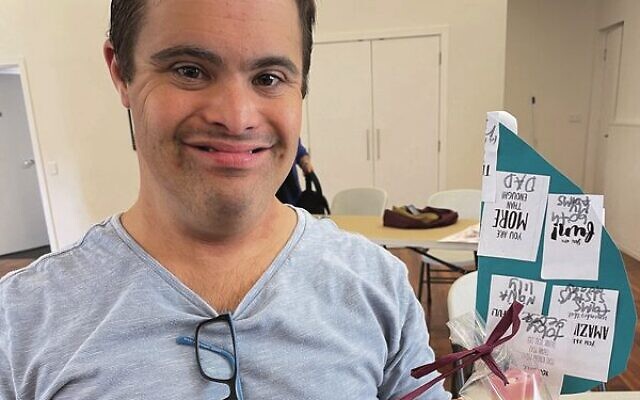 JewishCare client Michael with market products. JewishCare client Michael with market products.