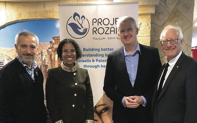 From left: Dr Jamal Rifi, Hadassah Hopsital's Dr Mushira Aboo Dia, MP Tony Burke and Ron Finkel at a Project Rozana event in 2018. From left: Dr Jamal Rifi, Hadassah Hopsital's Dr Mushira Aboo Dia, MP Tony Burke and Ron Finkel at a Project Rozana event in 2018.