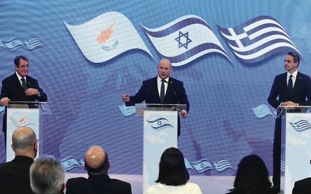Israeli Prime Minister Naftali Bennett (centre) speaks alongside Greek Prime Minister Kyriakos Mitsotakis (left) and Cypriot President Nicos Anastasiades. Photo: Amos Ben Gershom/GPO Israeli Prime Minister Naftali Bennett (centre) speaks alongside Greek Prime Minister Kyriakos Mitsotakis (left) and Cypriot President Nicos Anastasiades. Photo: Amos Ben Gershom/GPO