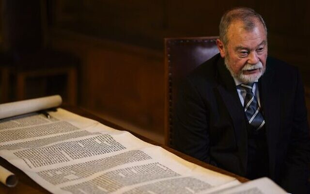 Uwe Mader with the Torah scroll fragments. Photo: Pawel Sosnowski Uwe Mader with the Torah scroll fragments. Photo: Pawel Sosnowski