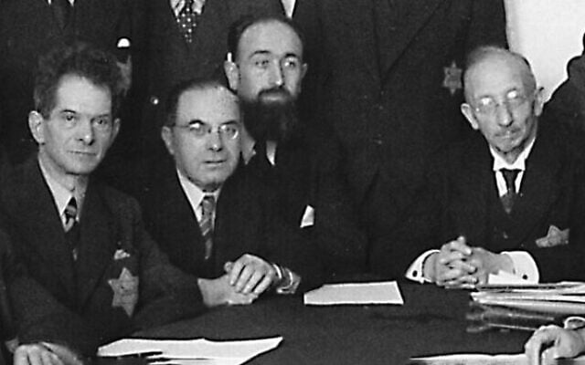 Arnold van den Bergh (second from left) with other members of the Nazi-appointed Jewish Council. Arnold van den Bergh (second from left) with other members of the Nazi-appointed Jewish Council.