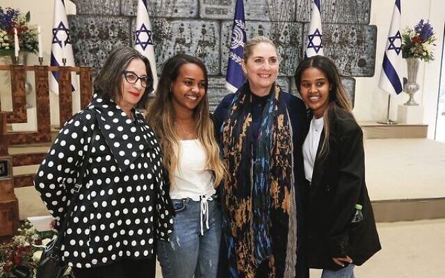 Michal Herzog (second right) with two Achotenu graduates and HWZOA's Audrey Shimron (left) Michal Herzog (second right) with two Achotenu graduates and HWZOA's Audrey Shimron (left)