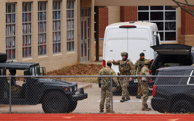 SWAT team members at Congregation Beth Israel Synagogue in Colleyville on Sunday.
Photo: Andy Jacobsohn/AFP via Getty Images SWAT team members at Congregation Beth Israel Synagogue in Colleyville on Sunday.
Photo: Andy Jacobsohn/AFP via Getty Images