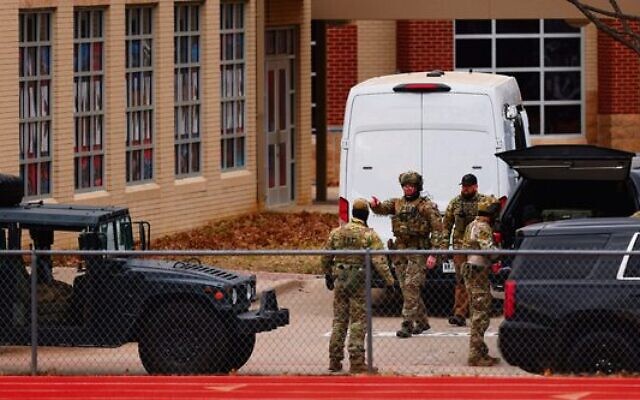 SWAT team members at Congregation Beth Israel synagogue in Colleyville, Texas on Sunday.
Photo: Andy Jacobsohn/AFP via Getty Images SWAT team members at Congregation Beth Israel synagogue in Colleyville, Texas on Sunday.
Photo: Andy Jacobsohn/AFP via Getty Images