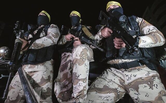 Members of the al-Aqsa Martyrs' Brigades at a press conference in Gaza on Tuesday.
Photo: EPA/Mohamed Saber Members of the al-Aqsa Martyrs' Brigades at a press conference in Gaza on Tuesday.
Photo: EPA/Mohamed Saber