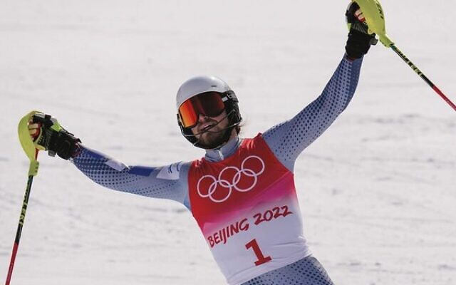 Israeli Barnabas Szollos celebrates coming sixth in his Winter Olympics skiing event. Photo: Luca Bruno Israeli Barnabas Szollos celebrates coming sixth in his Winter Olympics skiing event. Photo: Luca Bruno