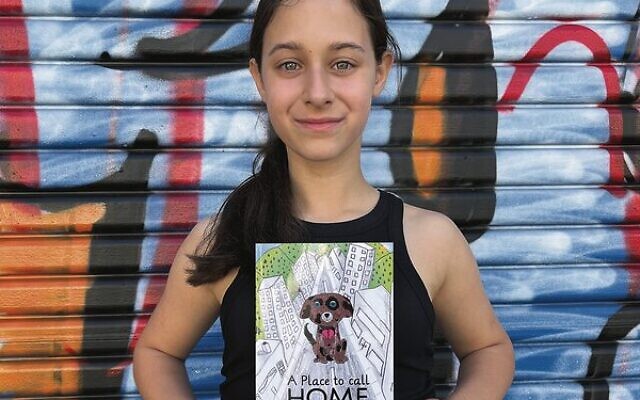 Miley Hope Siegel with her book, A Place to Call Home. Miley Hope Siegel with her book, A Place to Call Home.