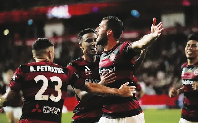 Tomer Hemed celebrates with his Wanderers teammates after their 2-0 win over Sydney FC last Saturday at Commbank Stadium. Photo: Western Sydney Wanderers Tomer Hemed celebrates with his Wanderers teammates after their 2-0 win over Sydney FC last Saturday at Commbank Stadium. Photo: Western Sydney Wanderers