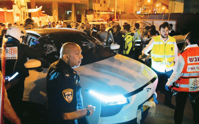 Israeli police officers and rescue forces at the scene of the Bnei Brak shooting attack. Photo: Avshalom Sassoni/Flash90 Israeli police officers and rescue forces at the scene of the Bnei Brak shooting attack. Photo: Avshalom Sassoni/Flash90