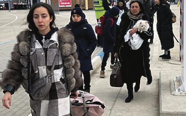 Ukrainians fleeing with their pets. Ukrainians fleeing with their pets.