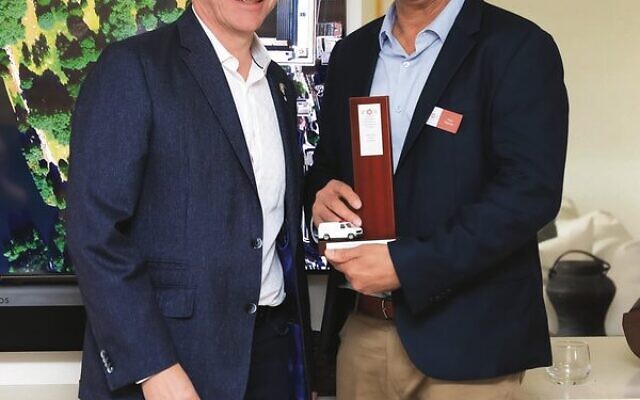 MDA president Tony Ziegler (left) presents a gift to Israeli ambassador Amir Maimon.
Photo: Gary Friedland MDA president Tony Ziegler (left) presents a gift to Israeli ambassador Amir Maimon.
Photo: Gary Friedland