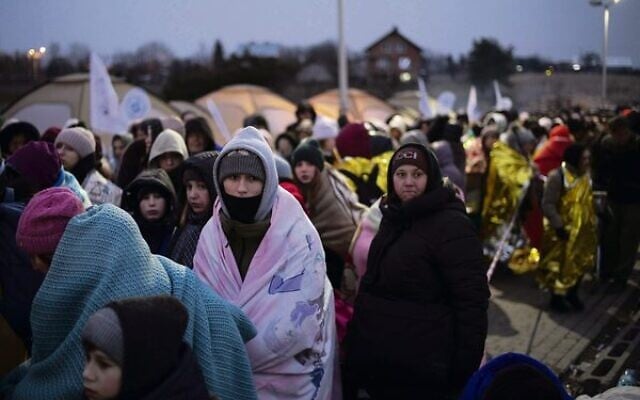Ukrainian refugees at the border crossing in Medyka, Poland.
Photo: AP Photo/Markus Schreiber Ukrainian refugees at the border crossing in Medyka, Poland.
Photo: AP Photo/Markus Schreiber