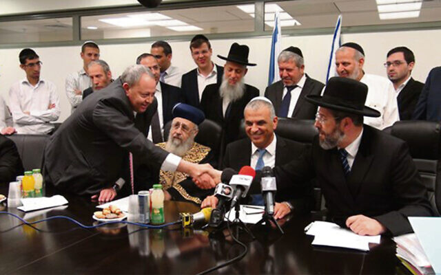 Hussein Jabar, left, meets Sephardi Chief Rabbi Yitzhak Yosef, finance minister Moshe Kahlon and Ashkenazi Chief Rabbi David Lau to purchase Israel's chametz, 2018. Photo: Times of Israel Hussein Jabar, left, meets Sephardi Chief Rabbi Yitzhak Yosef, finance minister Moshe Kahlon and Ashkenazi Chief Rabbi David Lau to purchase Israel's chametz, 2018. Photo: Times of Israel