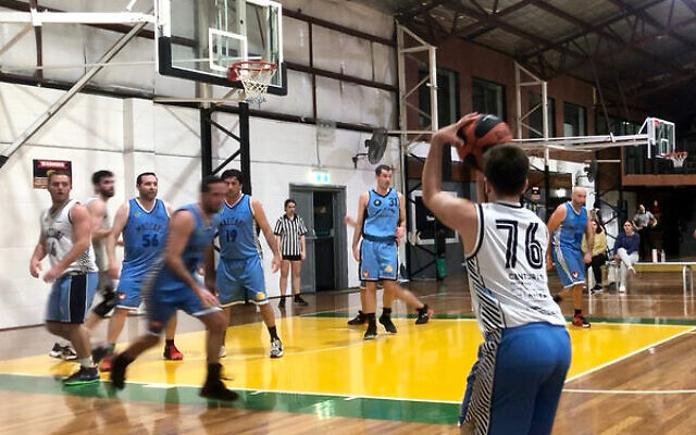Maccabi Rockets player Rick Schlessinger attempts a 3-pointer versus the Maccabi Kings on April 4 at Comets Basketball Stadium. Maccabi Rockets player Rick Schlessinger attempts a 3-pointer versus the Maccabi Kings on April 4 at Comets Basketball Stadium.