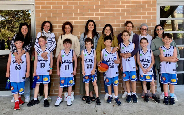 Maccabi NSW U12 Clippers players with their mums before their Easts Basketball League match on May 8. Maccabi NSW U12 Clippers players with their mums before their Easts Basketball League match on May 8.