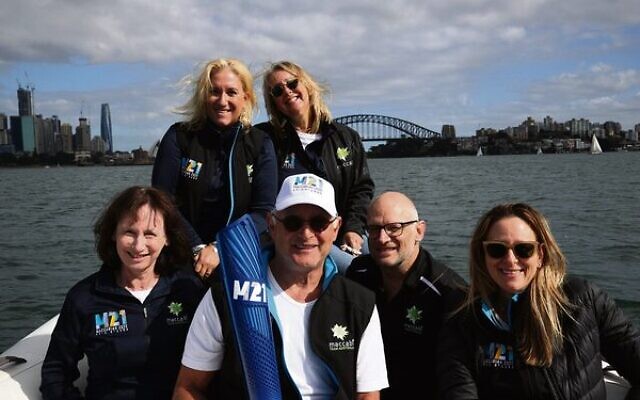 A 21st Maccabiah torch gets a boat ride on Sydney Harbour. Pictured with it are (back, from left) Giselle Berlinski, Lauren Ehrlich (front, from left) Debbie Rutstein, Barry Smorgon, Sam Gamsu and Jillian Sher. A 21st Maccabiah torch gets a boat ride on Sydney Harbour. Pictured with it are (back, from left) Giselle Berlinski, Lauren Ehrlich (front, from left) Debbie Rutstein, Barry Smorgon, Sam Gamsu and Jillian Sher.