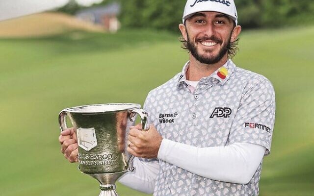 Max Homa holds the 2022 Wells Fargo trophy. Photo: PGA Tour Max Homa holds the 2022 Wells Fargo trophy. Photo: PGA Tour