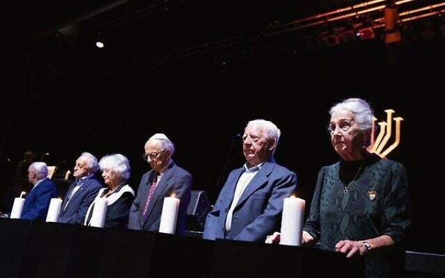 Holocaust survivors Jack Meister, Joe Symon, Ana and Gaby de Leon, Sam Young and Olga Horak lit the six candles in memory of the six million murdered Jews. Holocaust survivors Jack Meister, Joe Symon, Ana and Gaby de Leon, Sam Young and Olga Horak lit the six candles in memory of the six million murdered Jews.