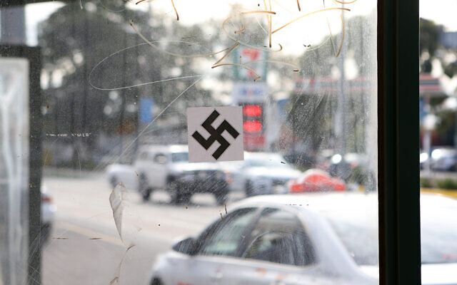 A swastika on a tram stop on Hawthorn Rd Caulfield, just up from the Beth Weizmann Community Centre. Photo: Peter Haskin A swastika on a tram stop on Hawthorn Rd Caulfield, just up from the Beth Weizmann Community Centre. Photo: Peter Haskin