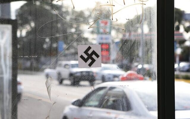 A swastika at a tram stop on Hawthorn Road near Beth Weizmann Community Centre. Photo: Peter Haskin A swastika at a tram stop on Hawthorn Road near Beth Weizmann Community Centre. Photo: Peter Haskin